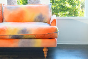 The Ashbury features fluted legs