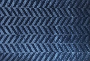 herring bone patterned rug in blue