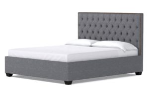 grey tufted bed on white background