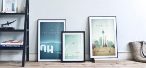 bookcase on left with three pictures