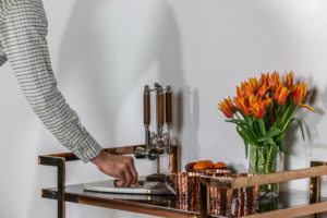 cocktail glasses and mugs on brown table