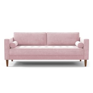 tufted sofa in pink against white background