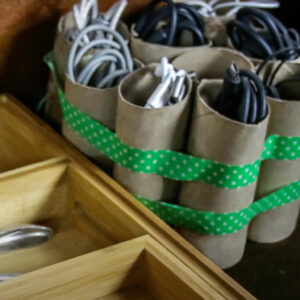 cords organized in toilet paper tubes
